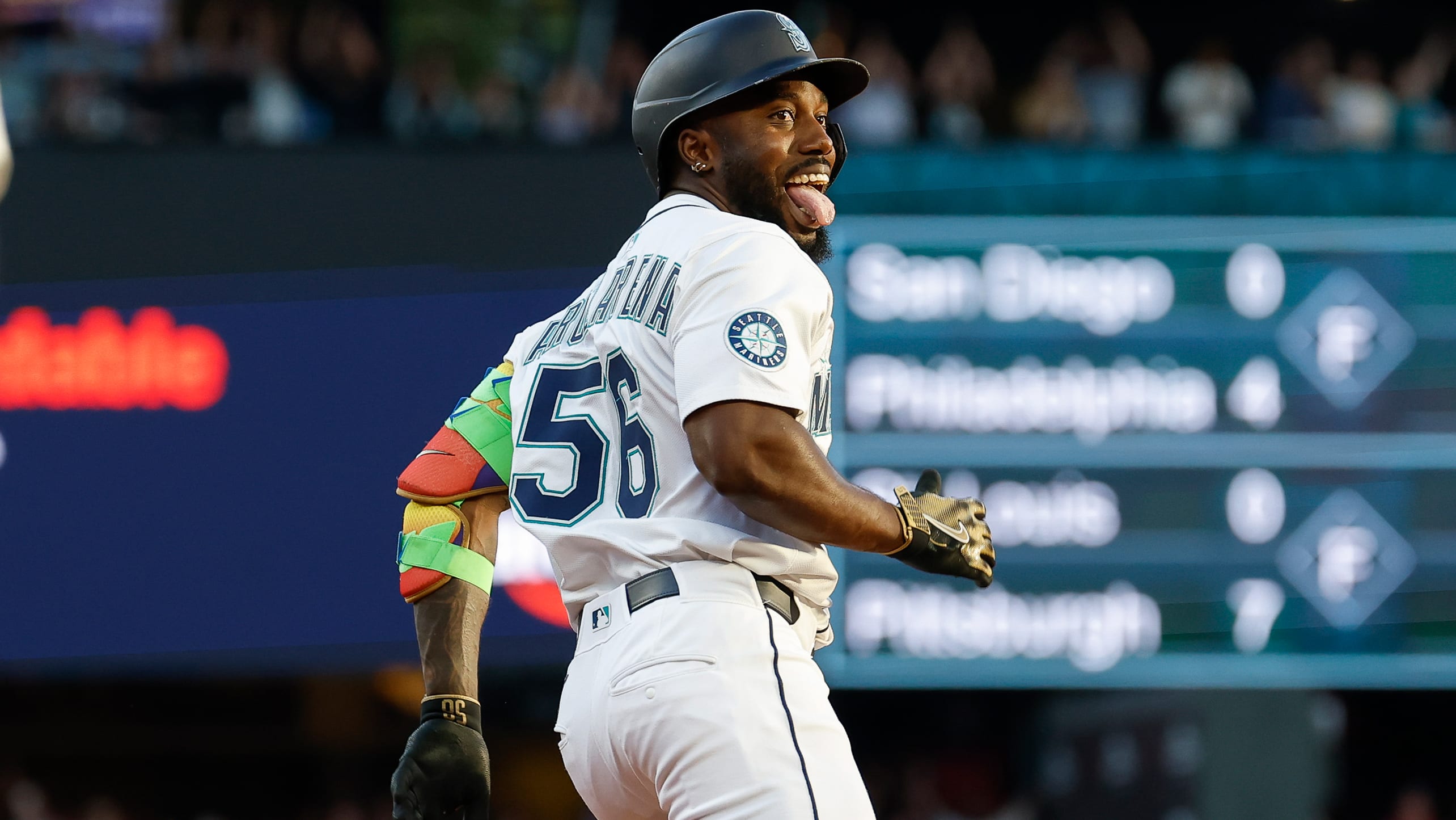 Randy Arozarena looks back and sticks out his tongue while rounding the bases
