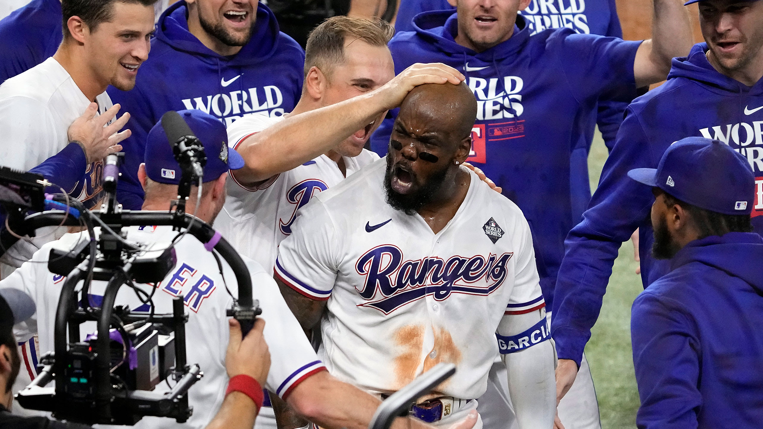 Adolis García and the Rangers celebrate