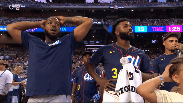 An animated gif of Vladimir Guerrero Jr. and Ronald Acuña Jr. reacting in awe to Oneil Cruz's 513-foot home run