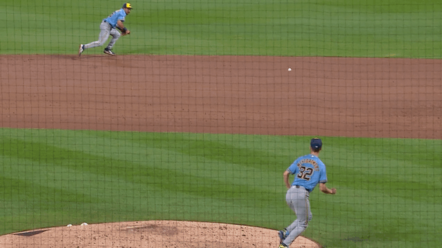 An animated GIF of David Hamilton making a diving play