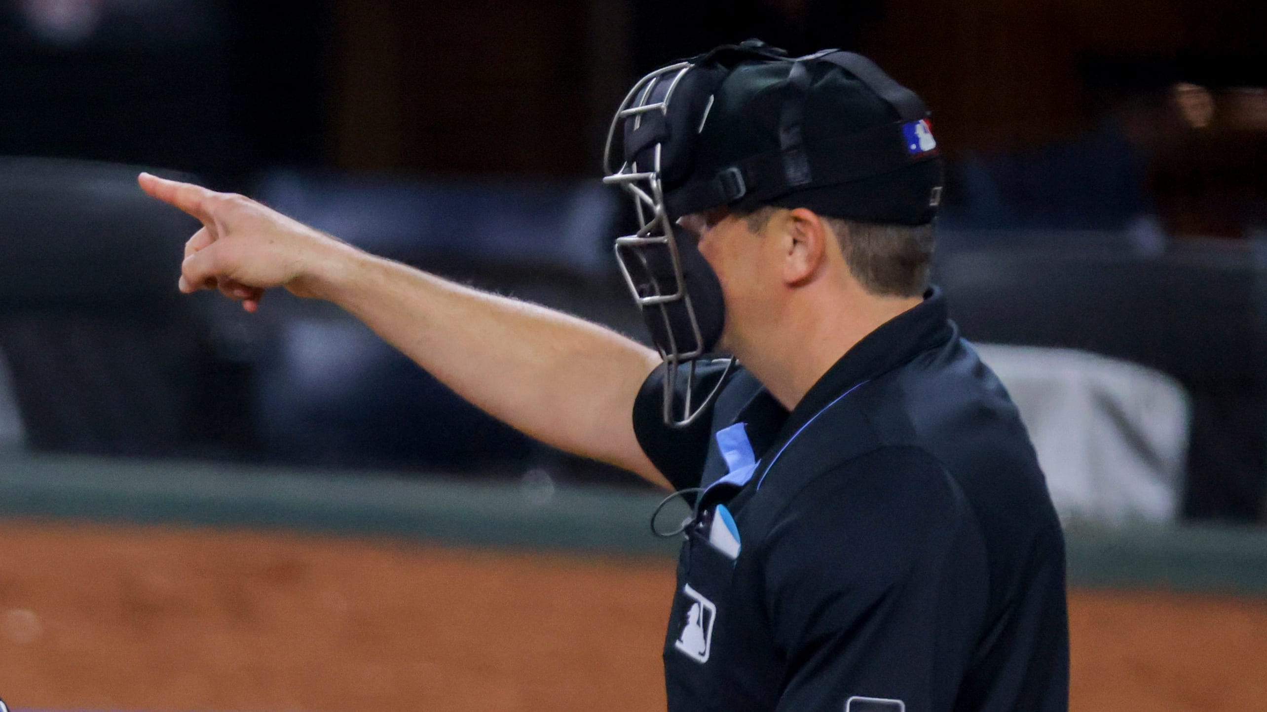 An umpire signals an intentional walk
