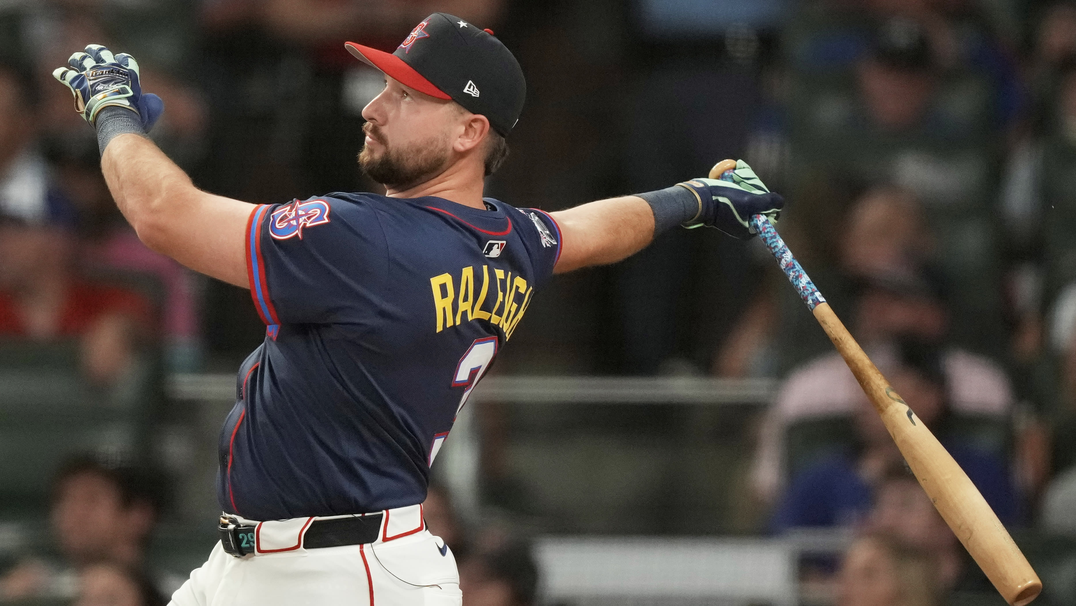 Cal Raleigh watches a ball soar at the 2025 Home Run Derby