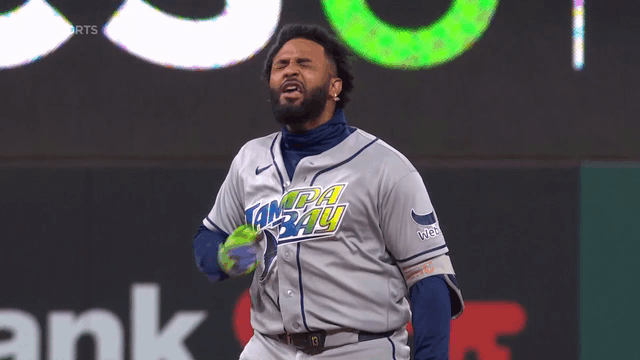 An animated gif of Junior Caminero celebrating after his go-ahead double