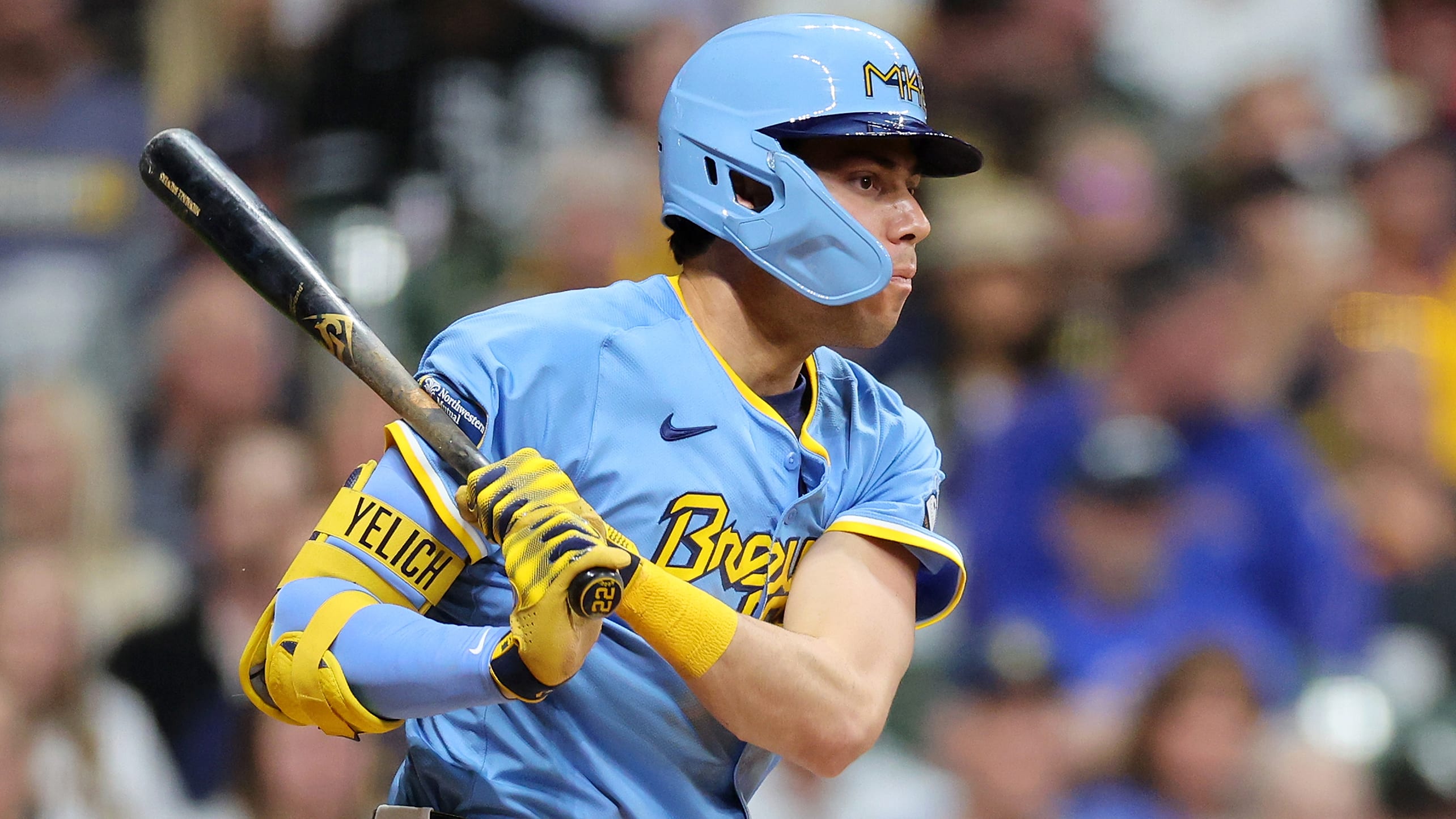 Christian Yelich follows through on a swing