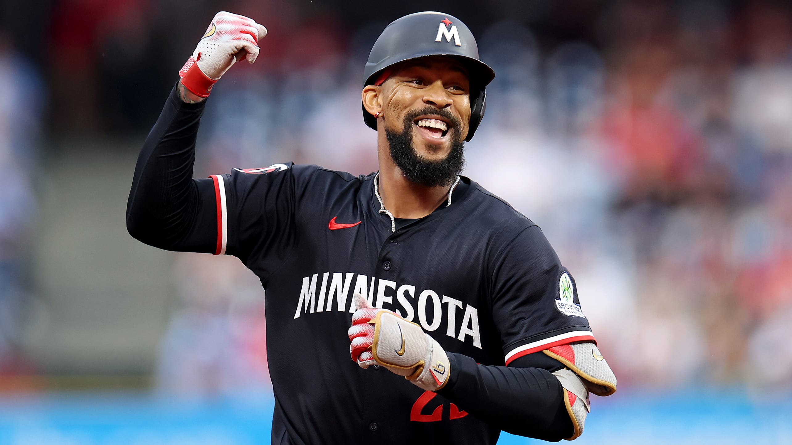 Byron Buxton celebrates after leading off the game with a home run