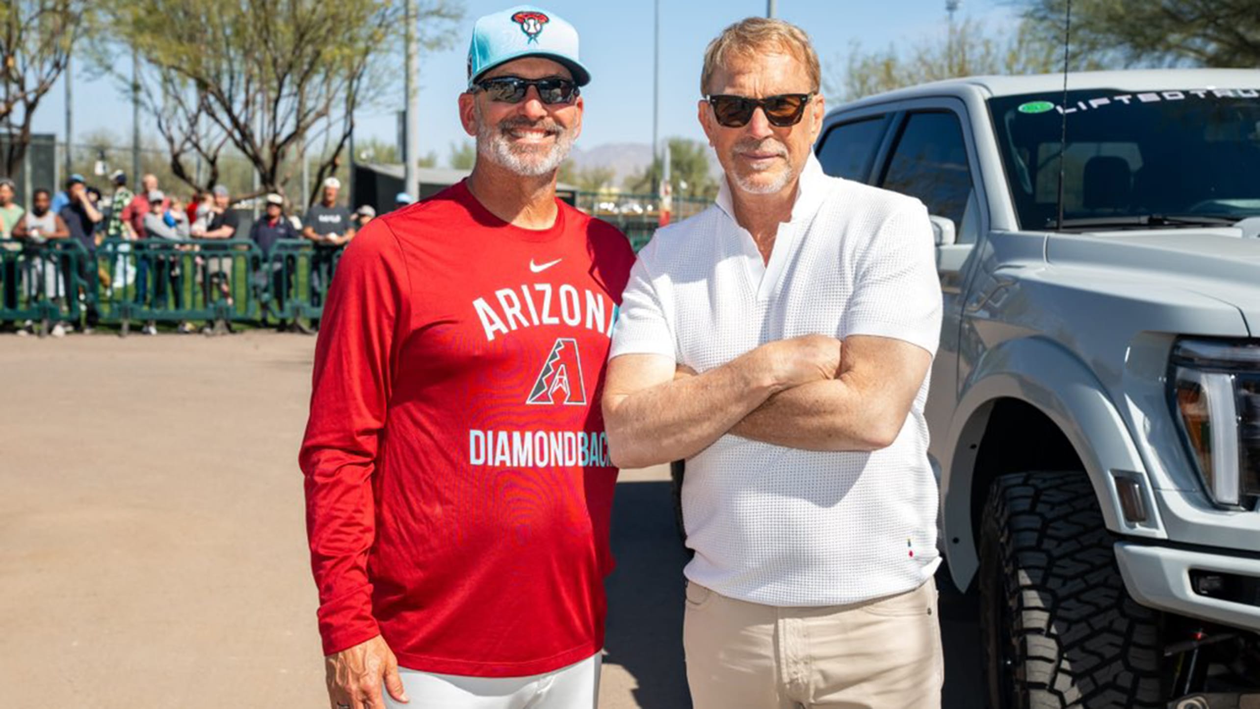 Torey Lovullo and Kevin Costner