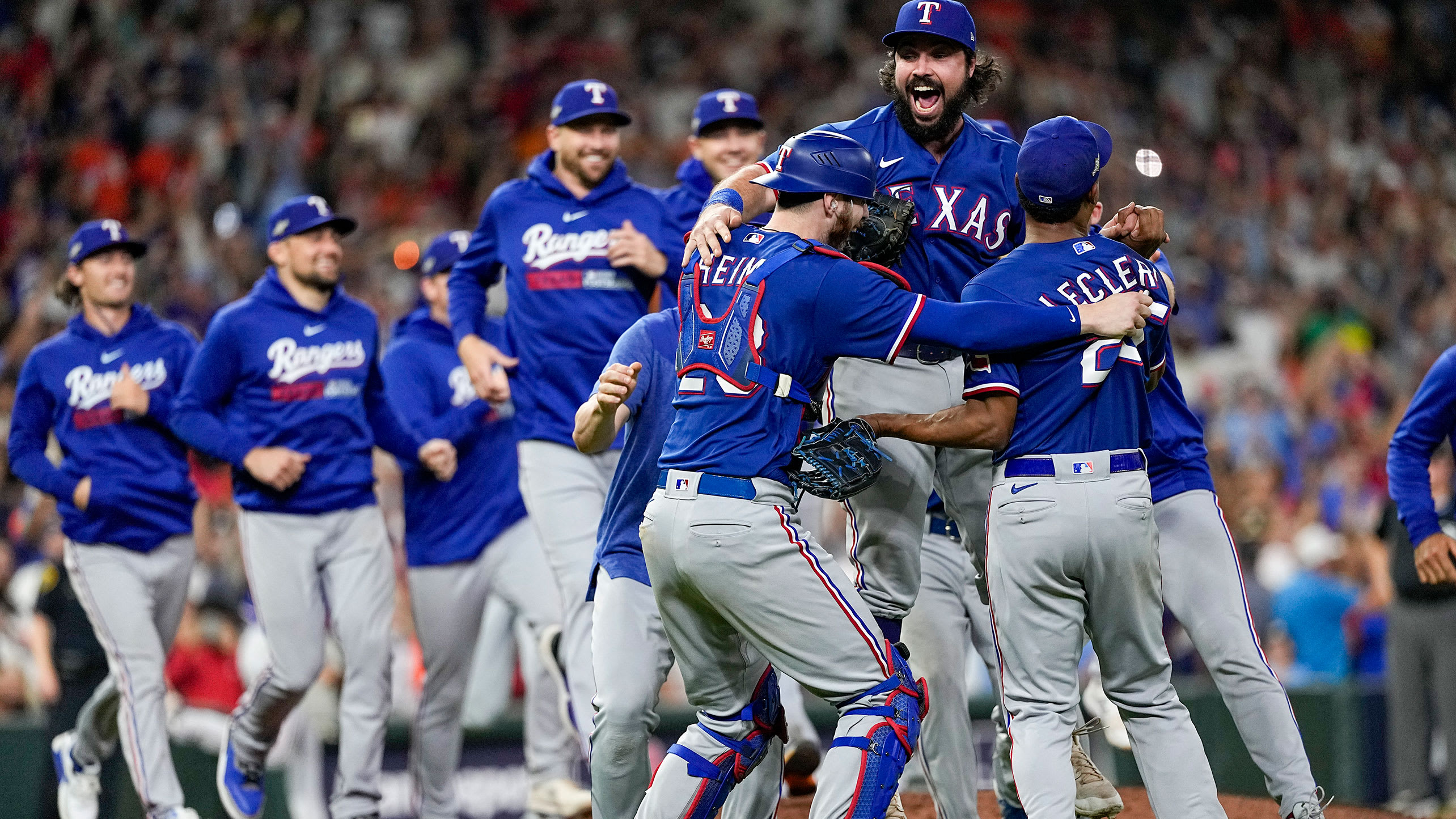 The Rangers celebrate winning the ALCS