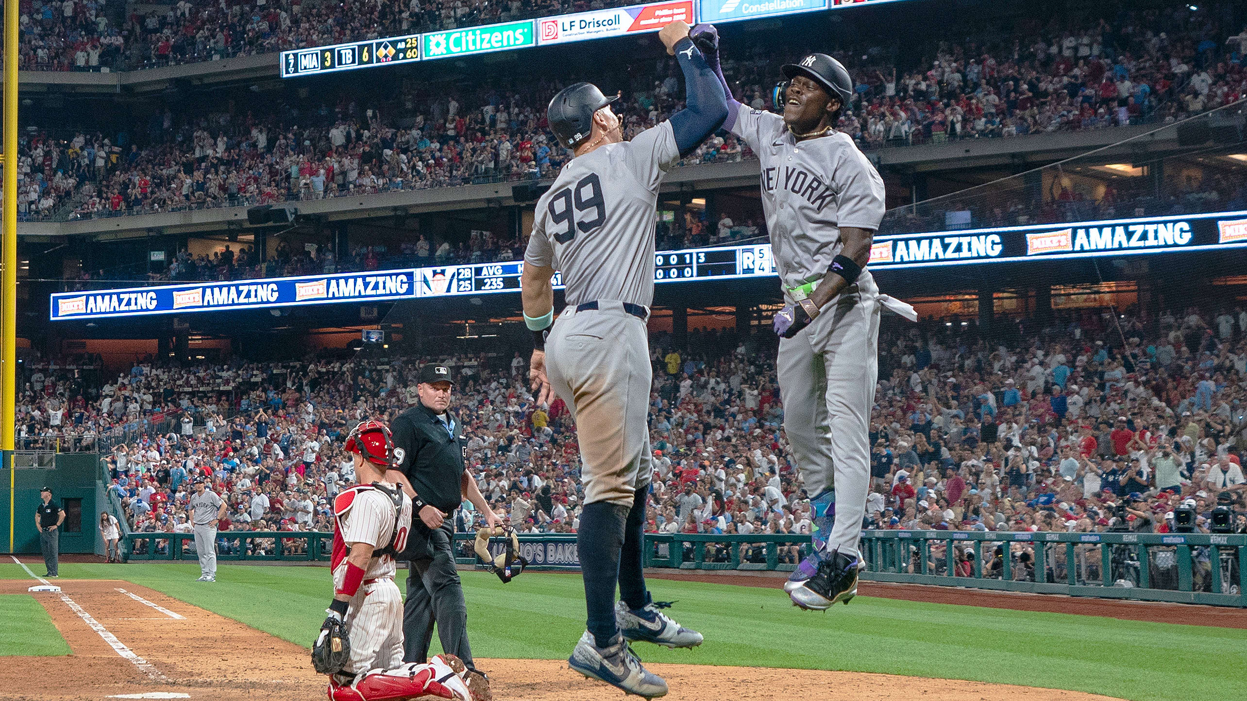 Jazz Chisholm Jr. matches Aaron Judge's height in celebrating a home run