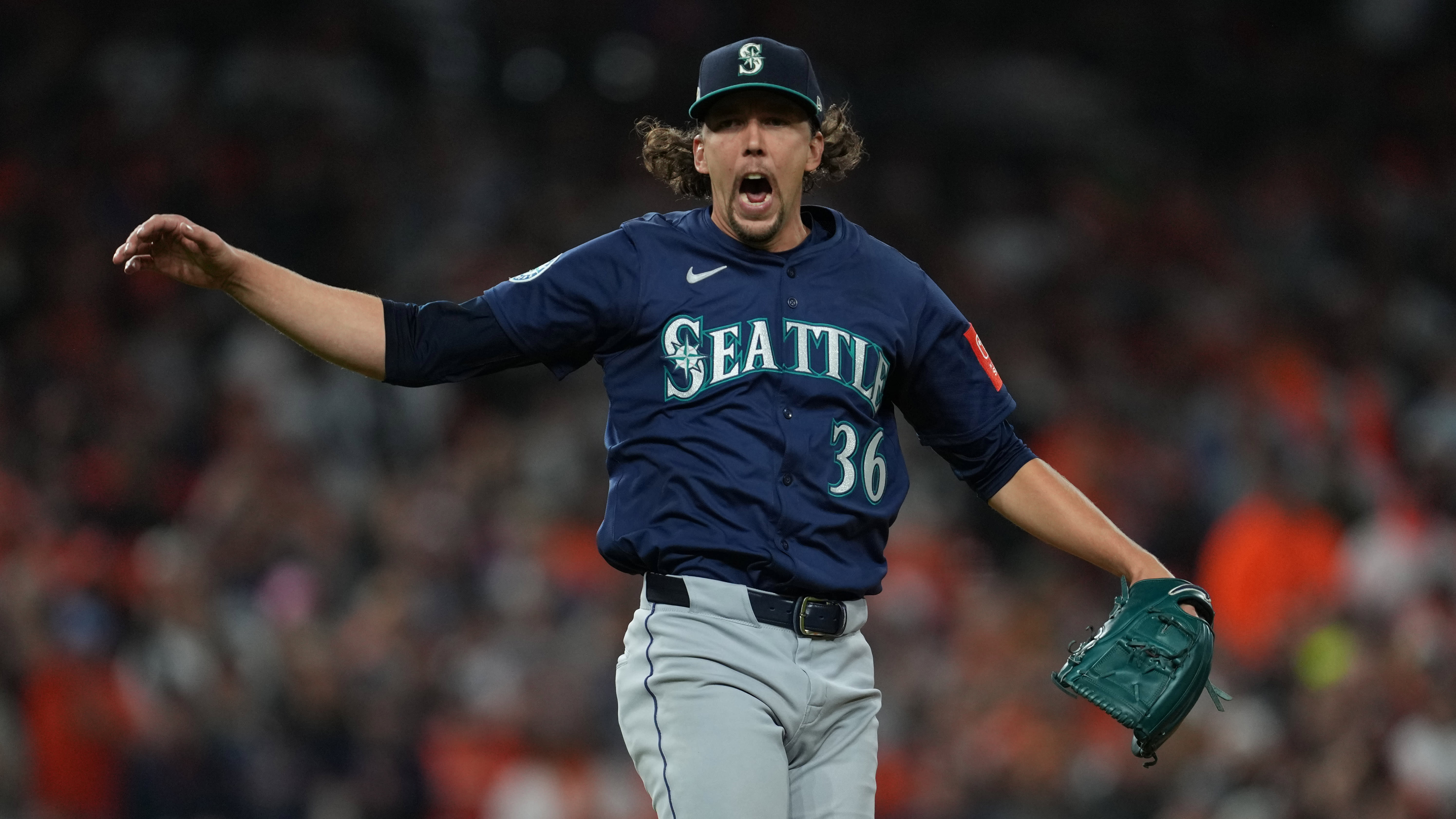 Logan Gilbert yells in celebration