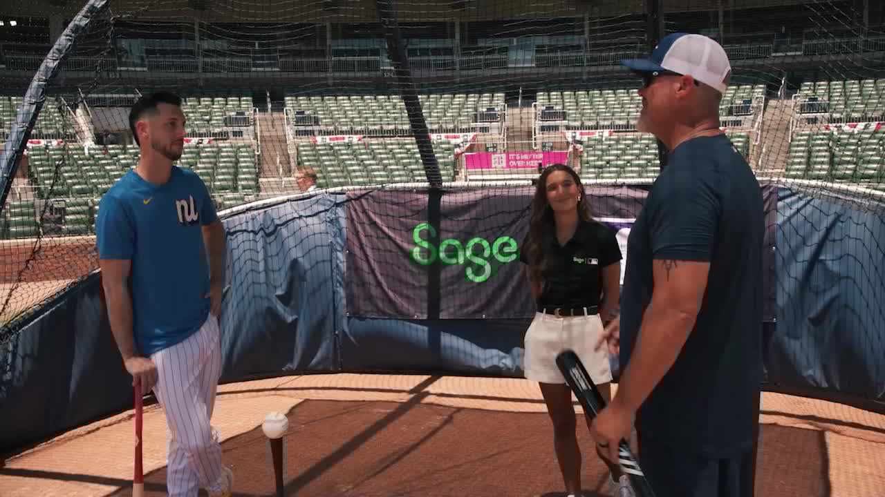 Kyle Tucker and Chipper Jones in the batting cage