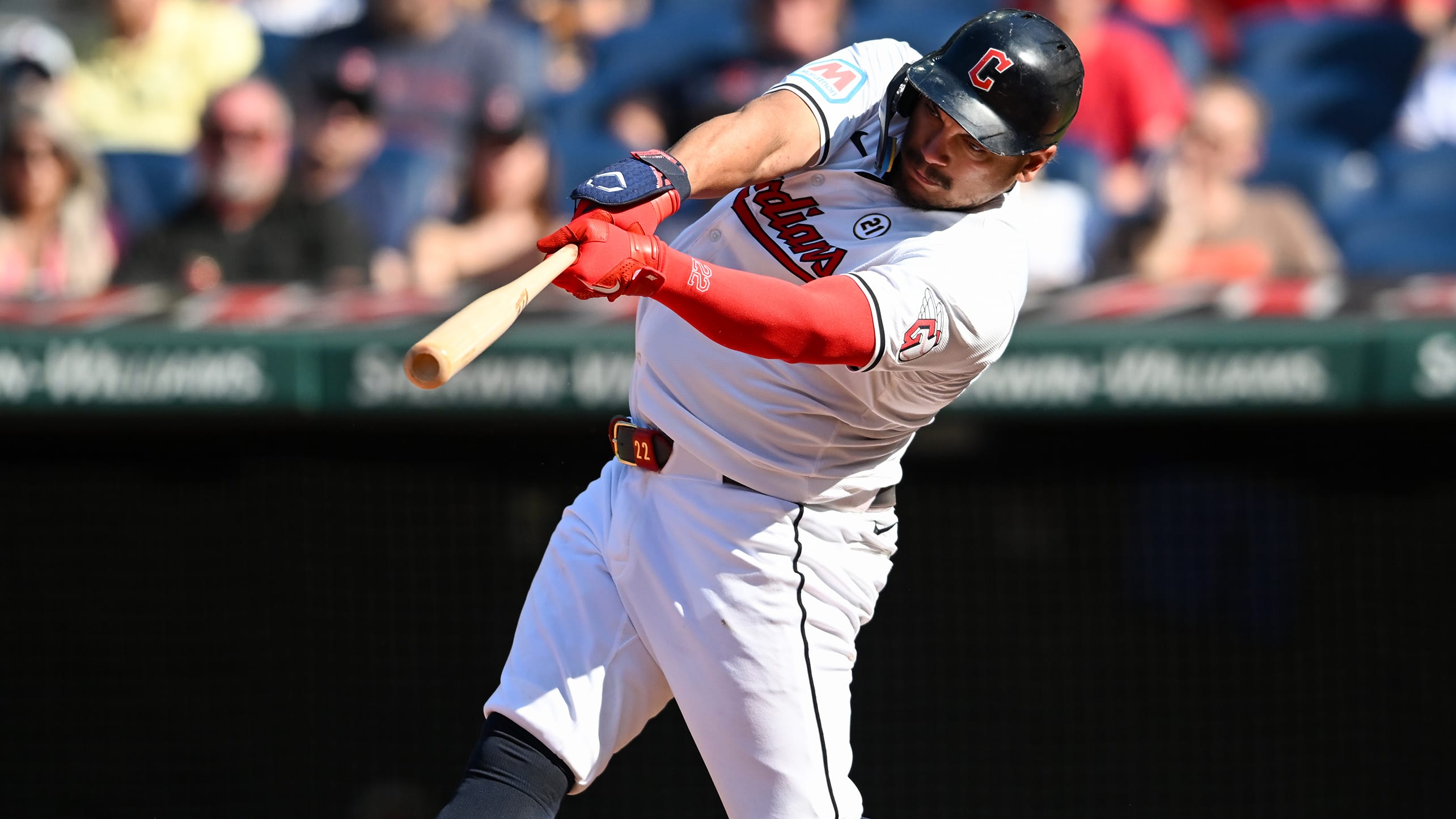 Josh Naylor follows through on a swing