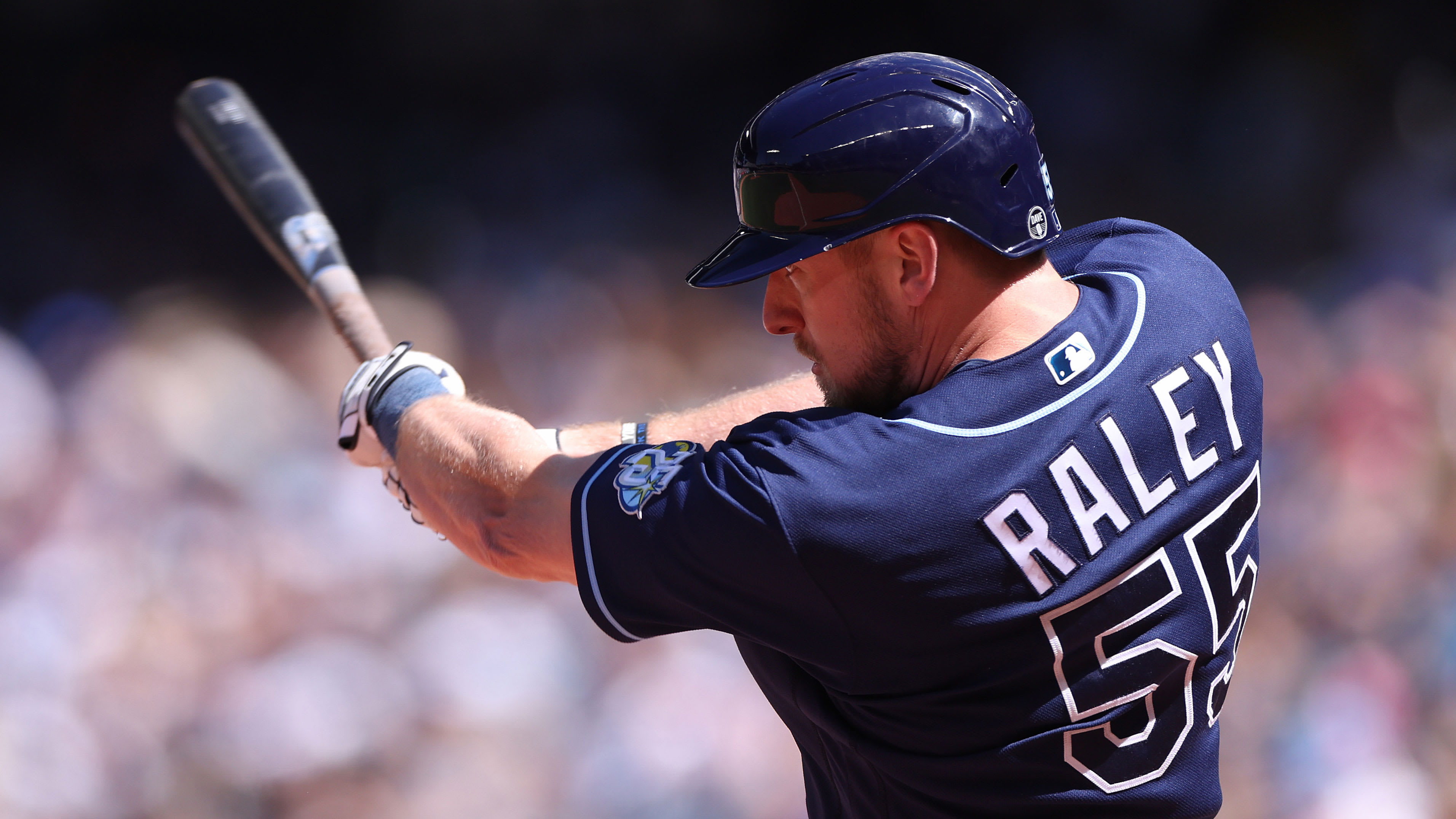 Luke Raley swings a bat