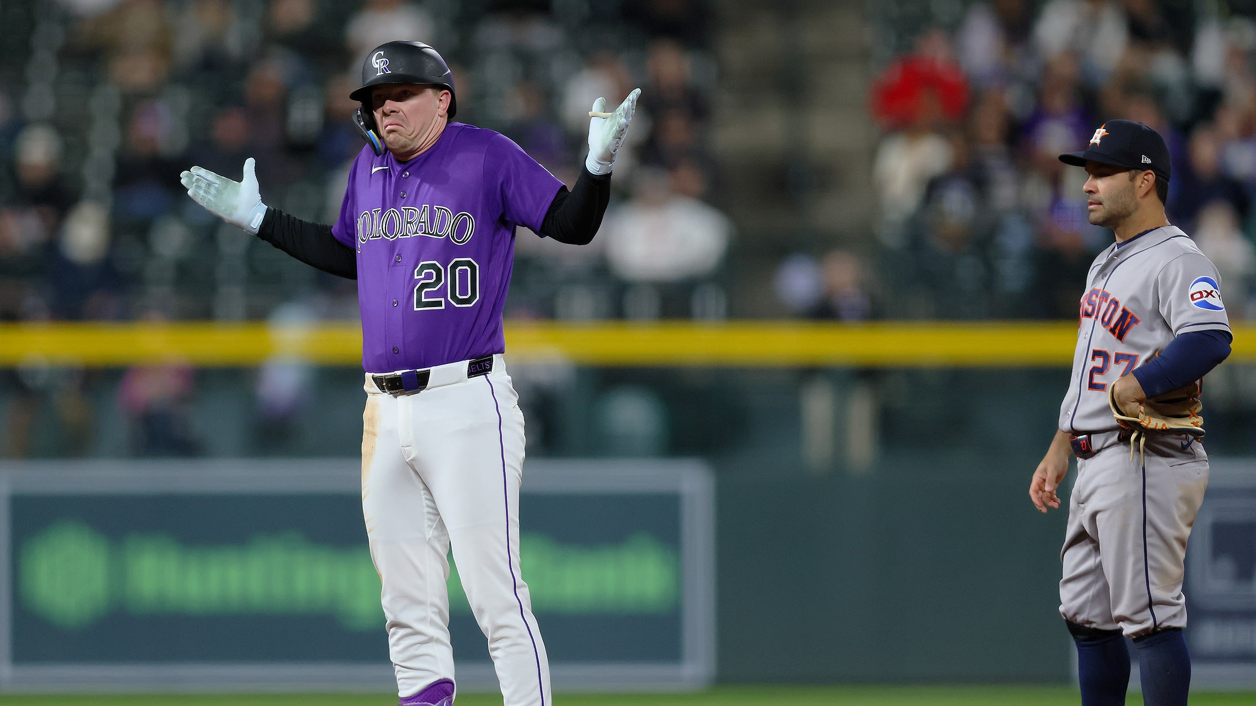 Troy Johnston stands on second base, shrugging