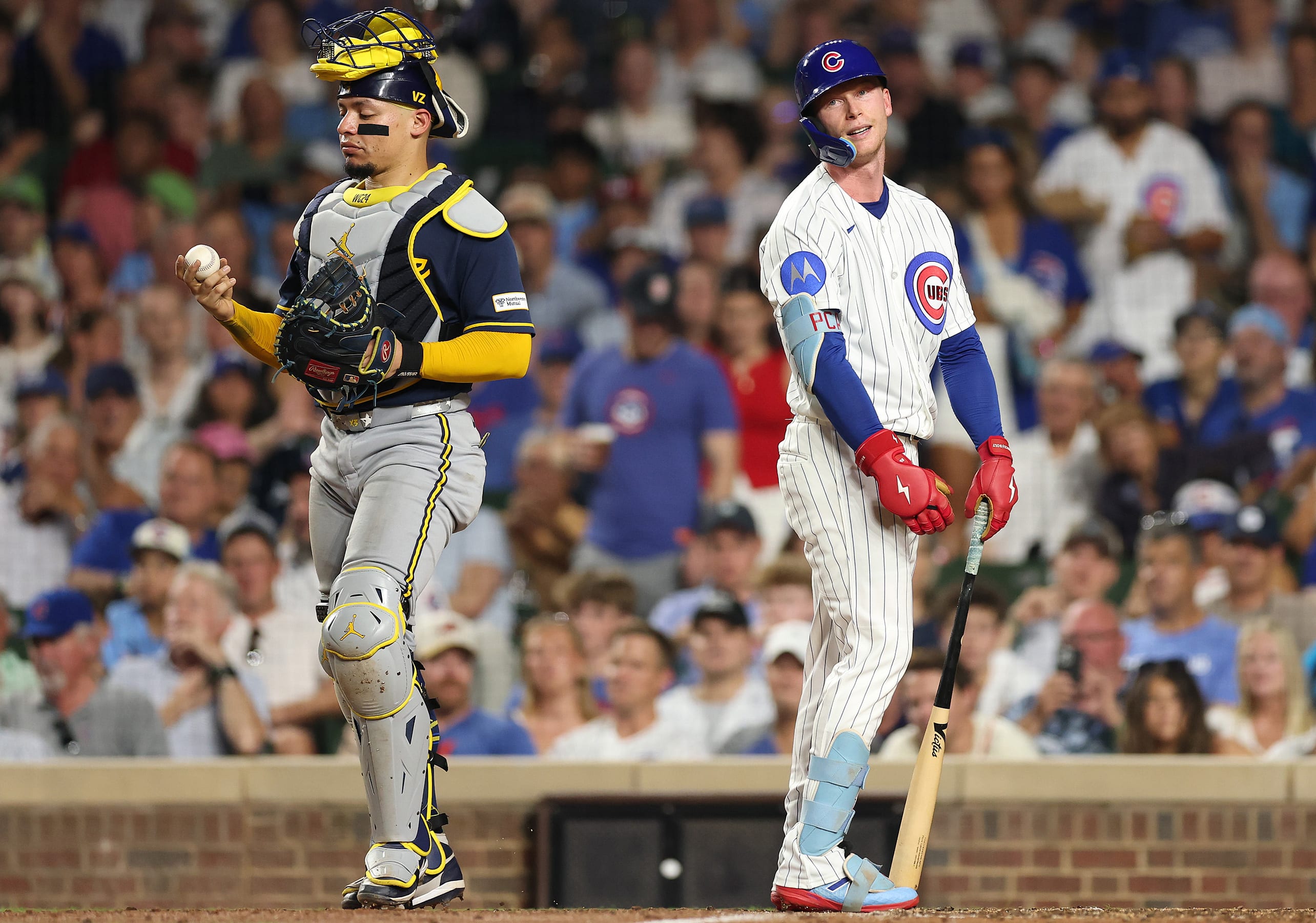 Brewers catcher William Contreras (left) and Cubs center fielder Pete Crow-Armstrong