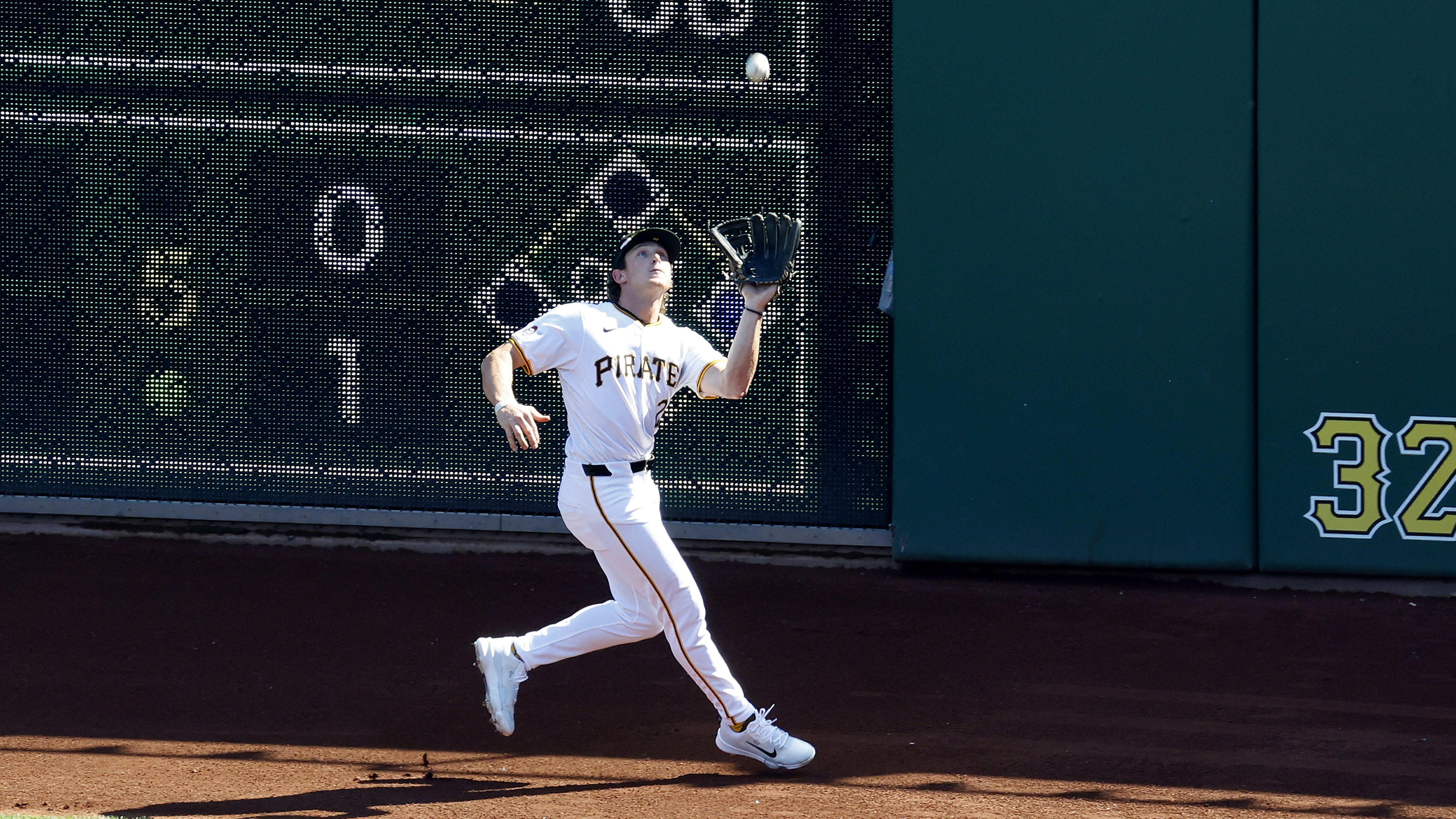 Billy Cook makes a catch on the warning track