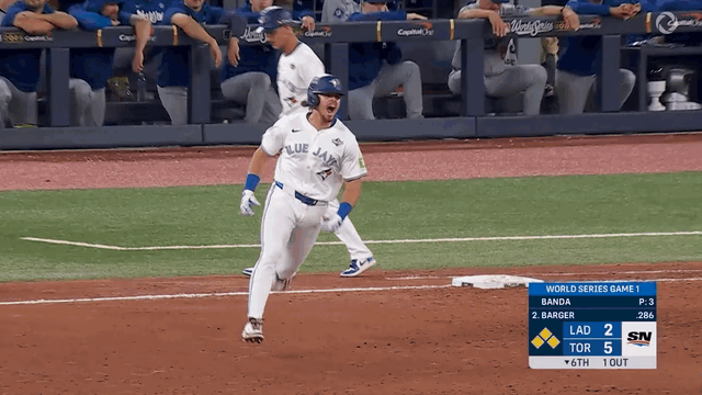 An animated gif of Addison Barger celebrating as he rounds first base
