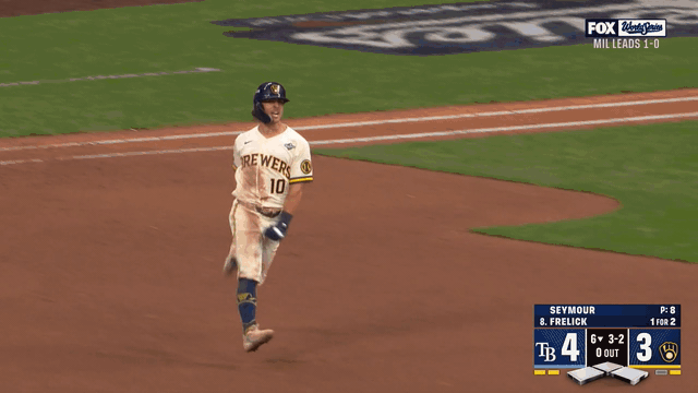 An animated gif of Sal Frelick celebrating as he rounds second base and William Contreras jumping in front of the dugout