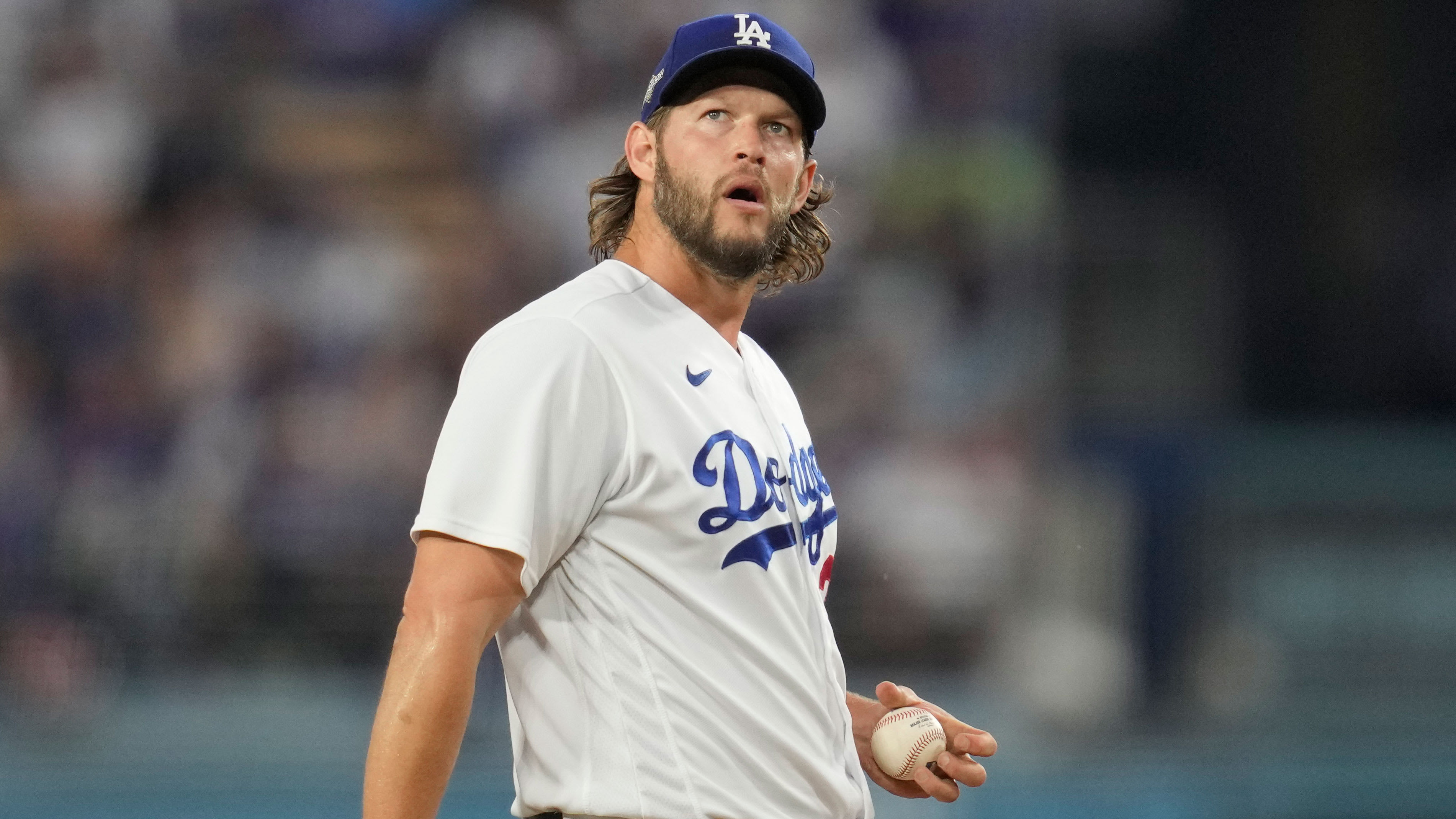 Clayton Kershaw gazes up during a break in the action