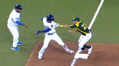 South Africa third baseman Anthony Phillips makes the tag