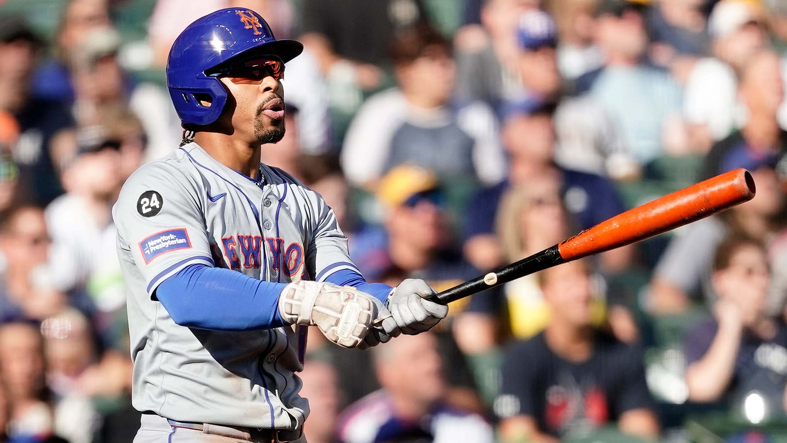 Francisco Lindor follows through on a swing