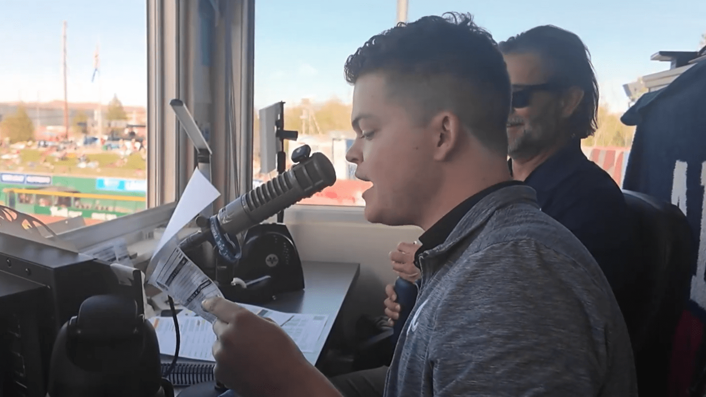 The starting lineups are read before a Minor League game
