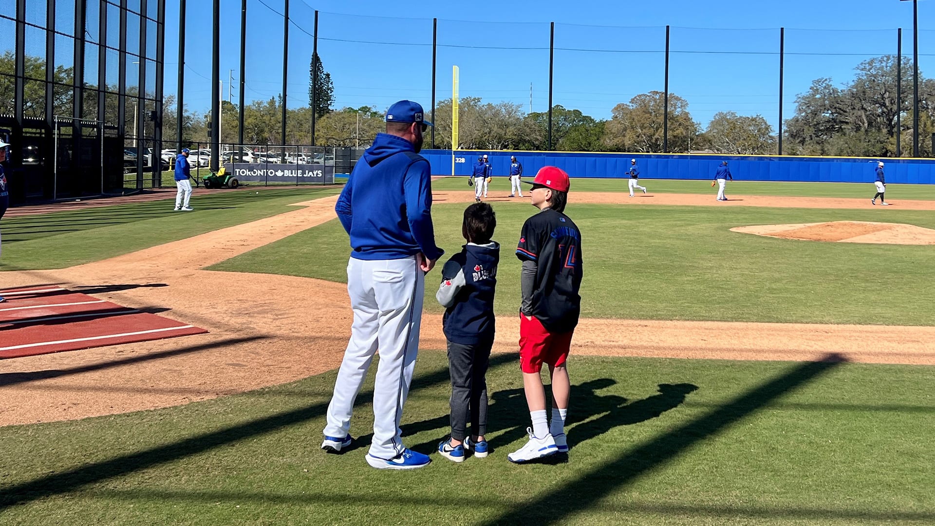 Blue Jays manager John Schneider with his sons, Gunner and Grayson