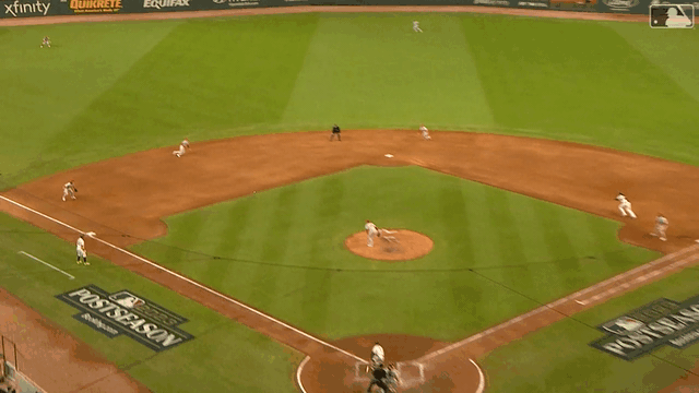 An animated gif of Trea Turner's diving stop to start a double play