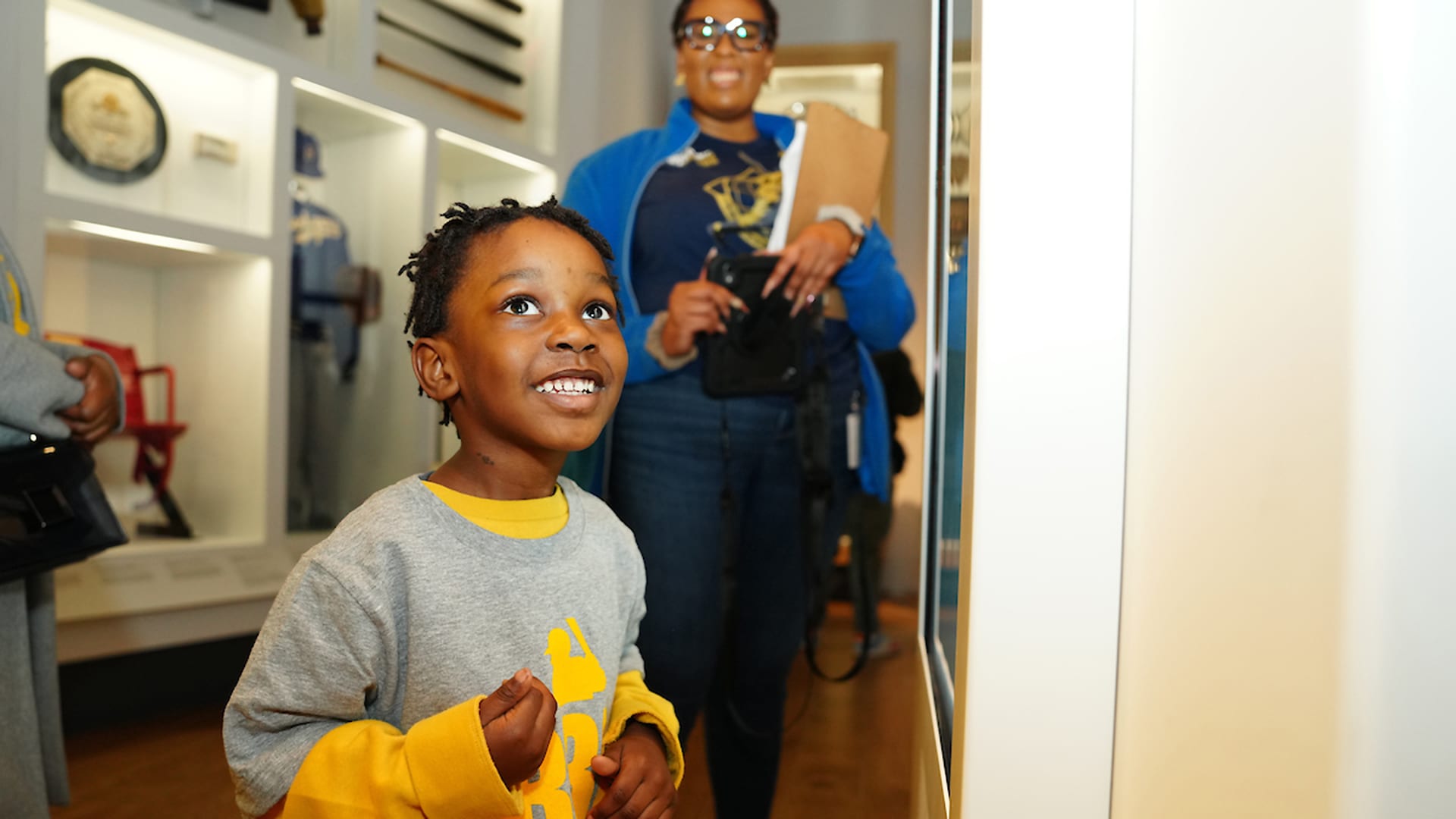 A child smiles at the Jackie Robinson Museum