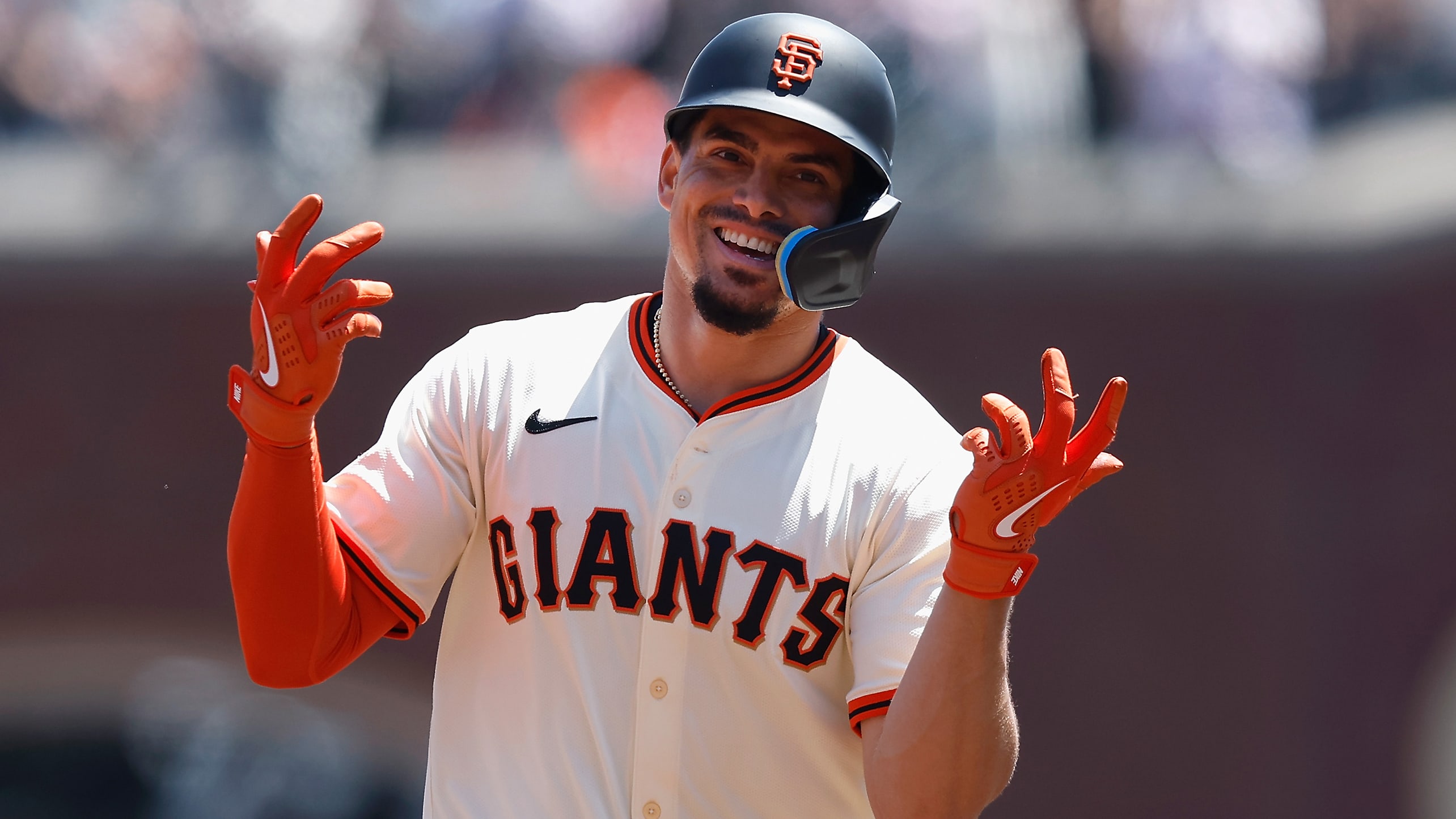 Willy Adames smiles as he rounds the bases after hitting a home run