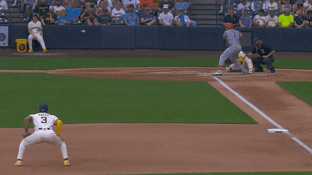 An animated GIF of Joey Ortiz making a diving backhand stop