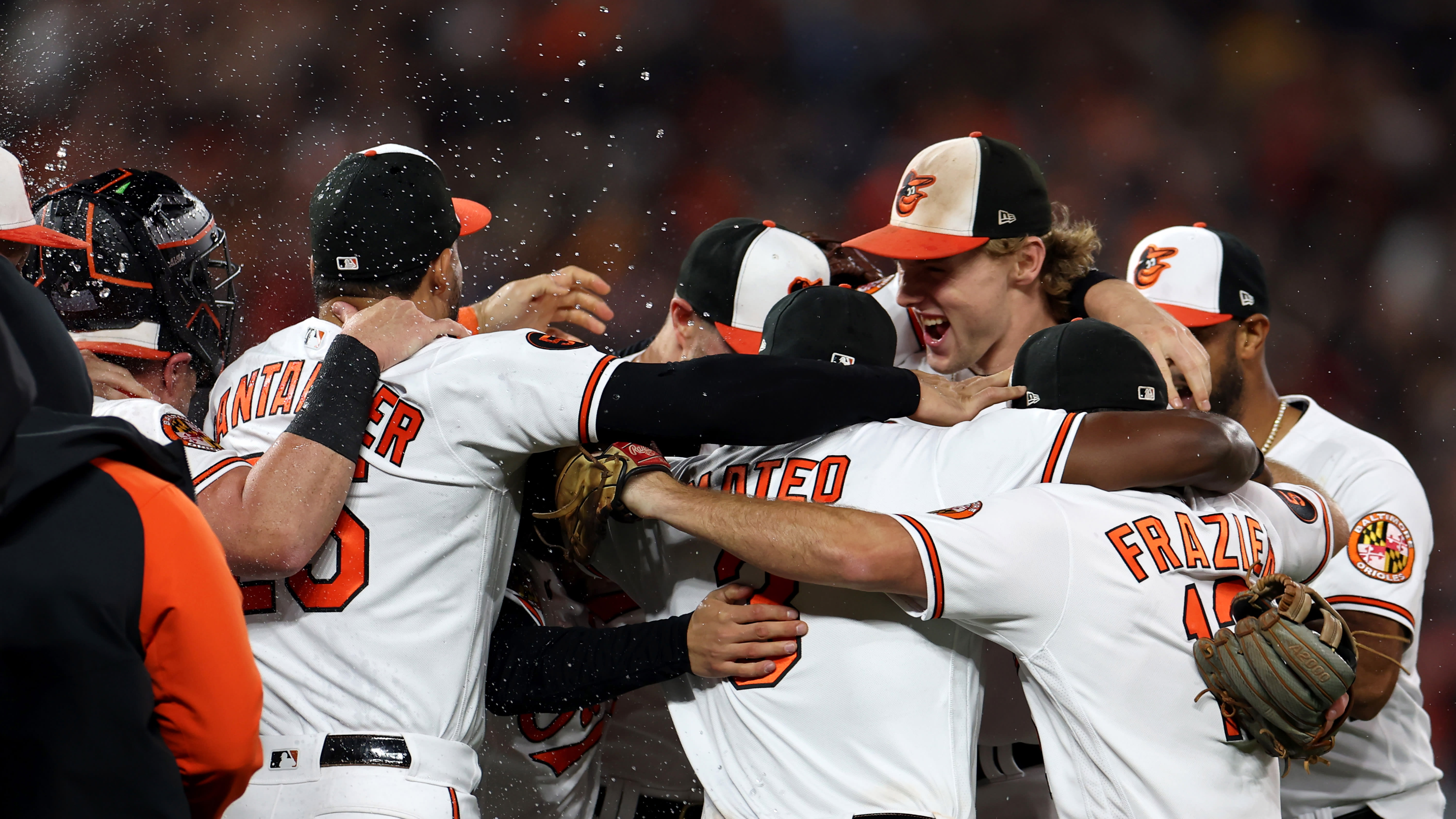 The Orioles celebrate after clinching the AL West title