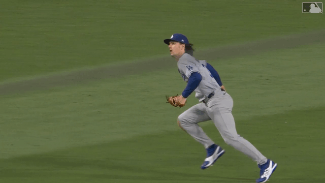 An animated GIF of James Outman making a diving catch