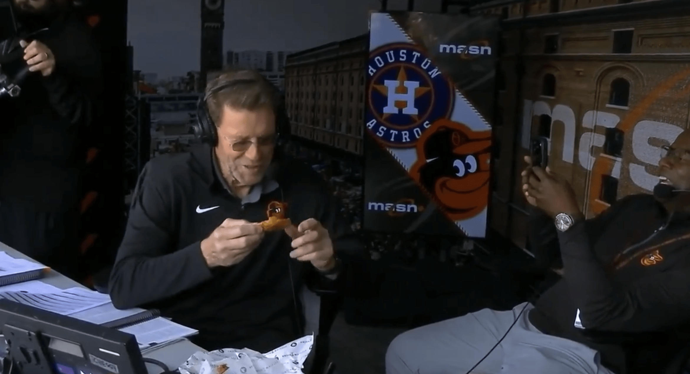 Hall of Famer Jim Palmer eating a chicken wing for the first time