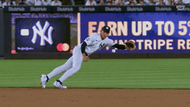 An animated gif of George Lombard Jr. making a diving stop