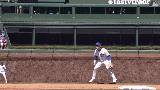 Nico Hoerner makes a diving play at Wrigley Field