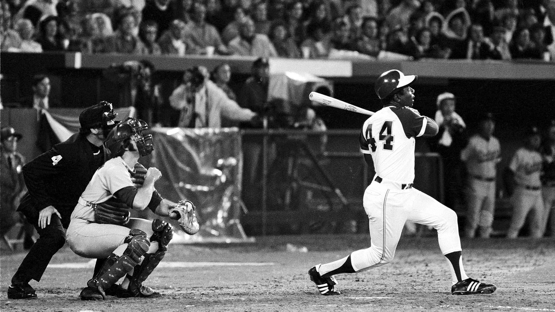 Hank Aaron follows through on his 715th home run