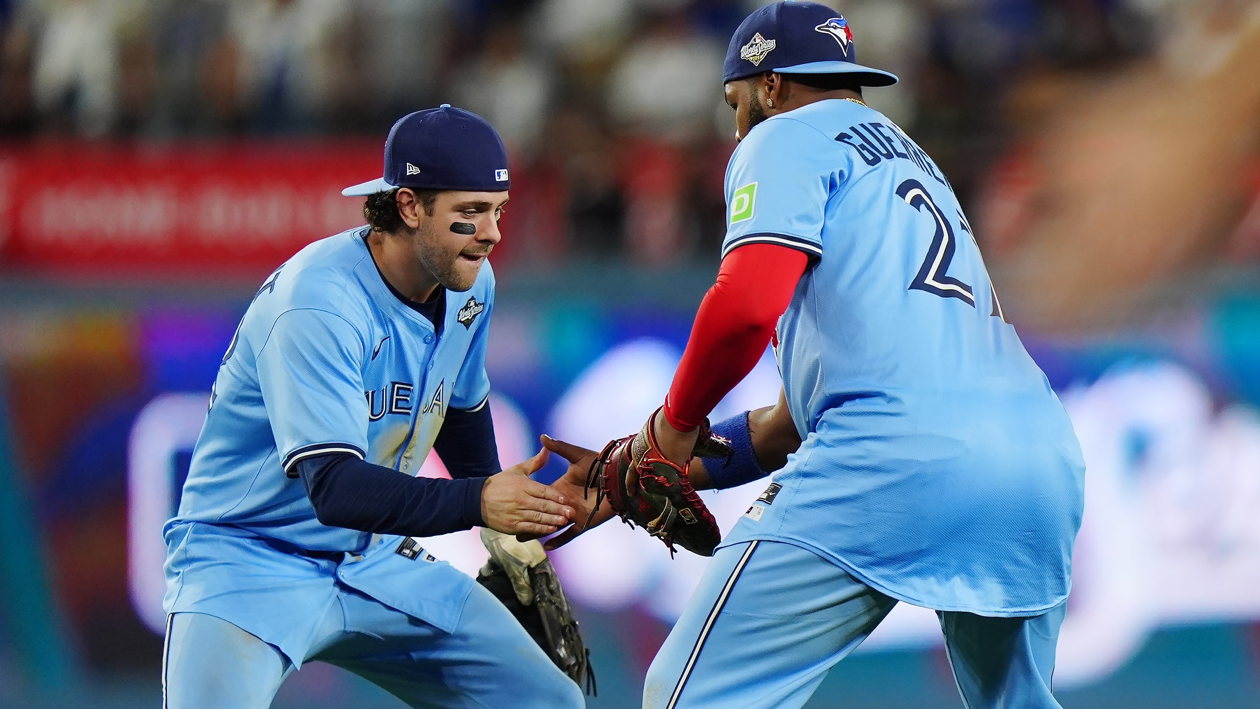 Ernie Clement and Vladimir Guerrero Jr.