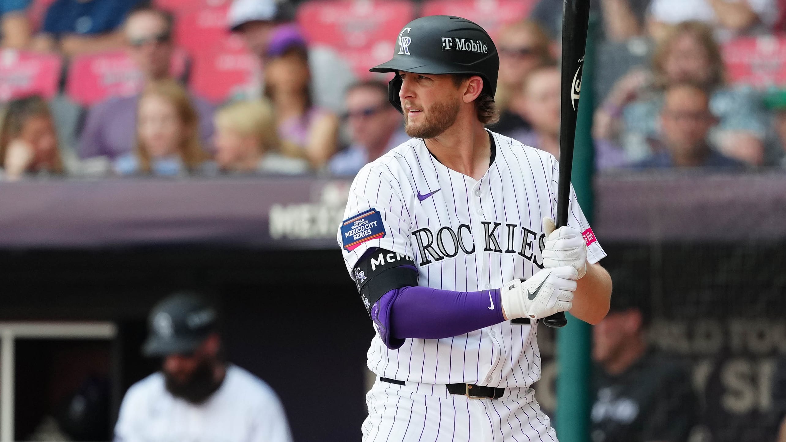 Ryan McMahon stands in