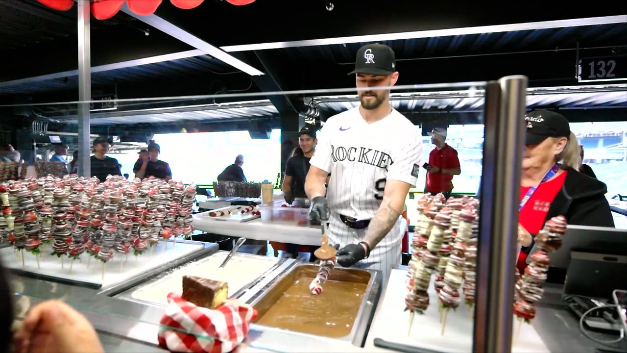 Brenton Doyle serves concessions in full uniform