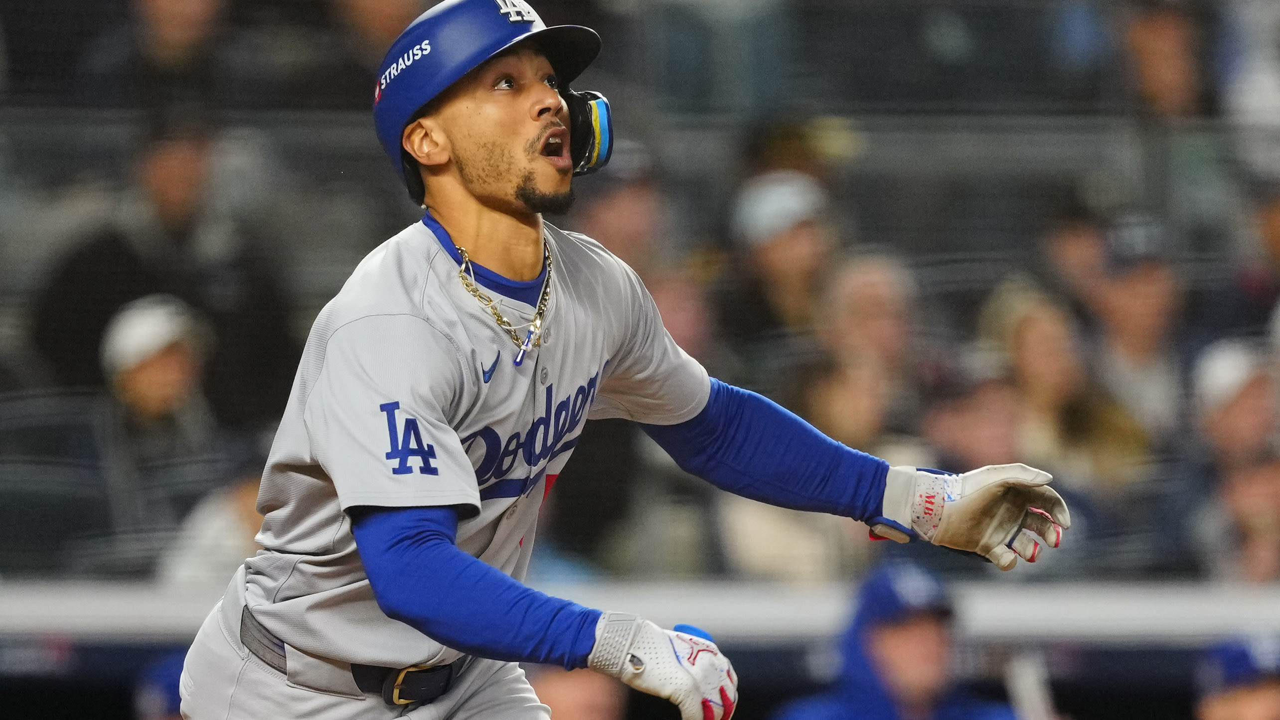 Mookie Betts watches his bloop RBI single in Game 3