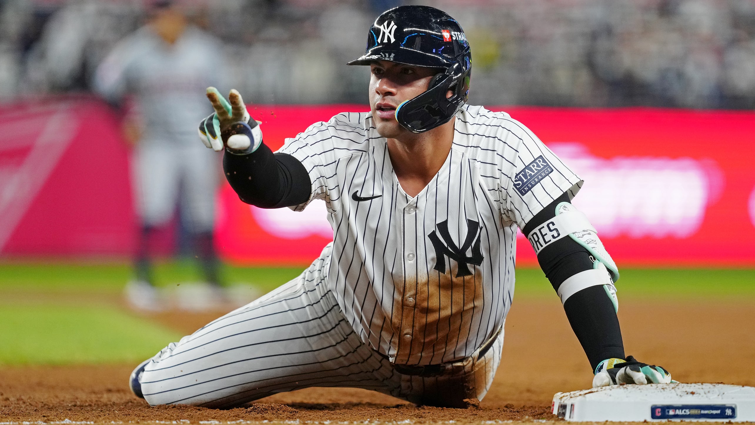 Gleyber Torres slides into second base