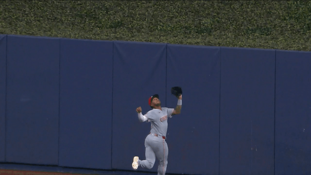 An animated gif of Dane Myers making a leaping catch