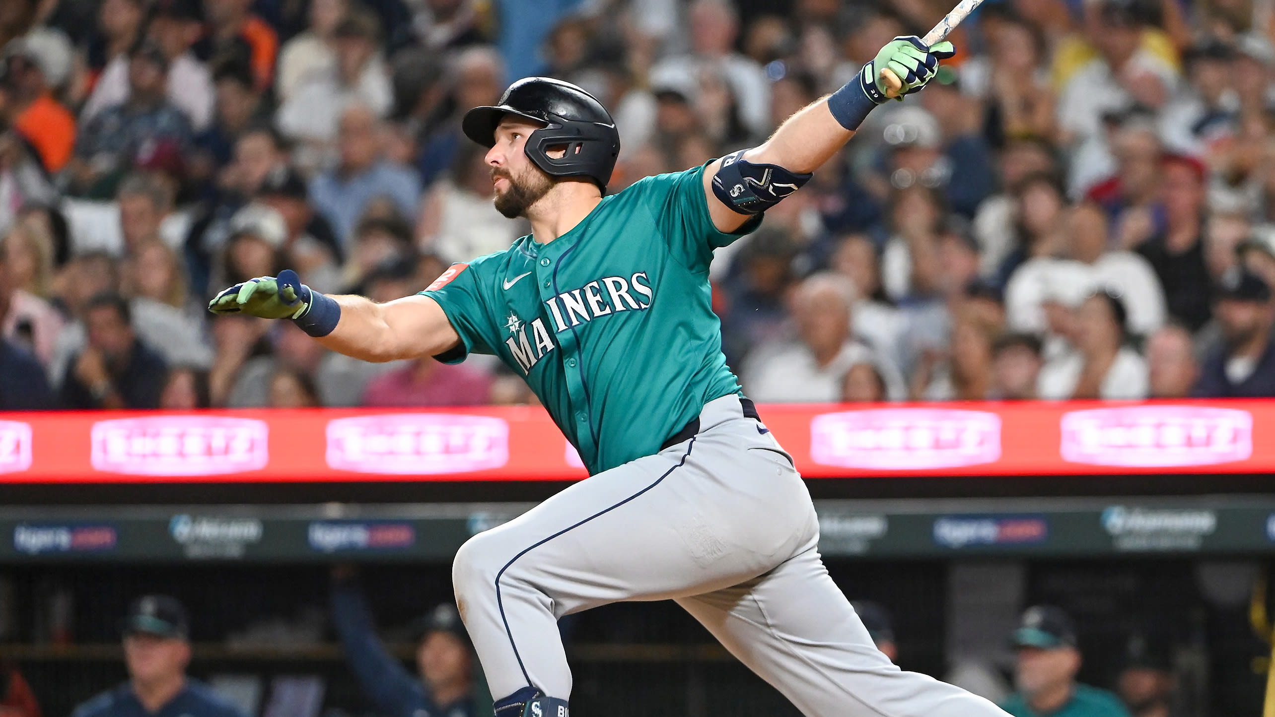 Cal Raleigh follows through on a home run