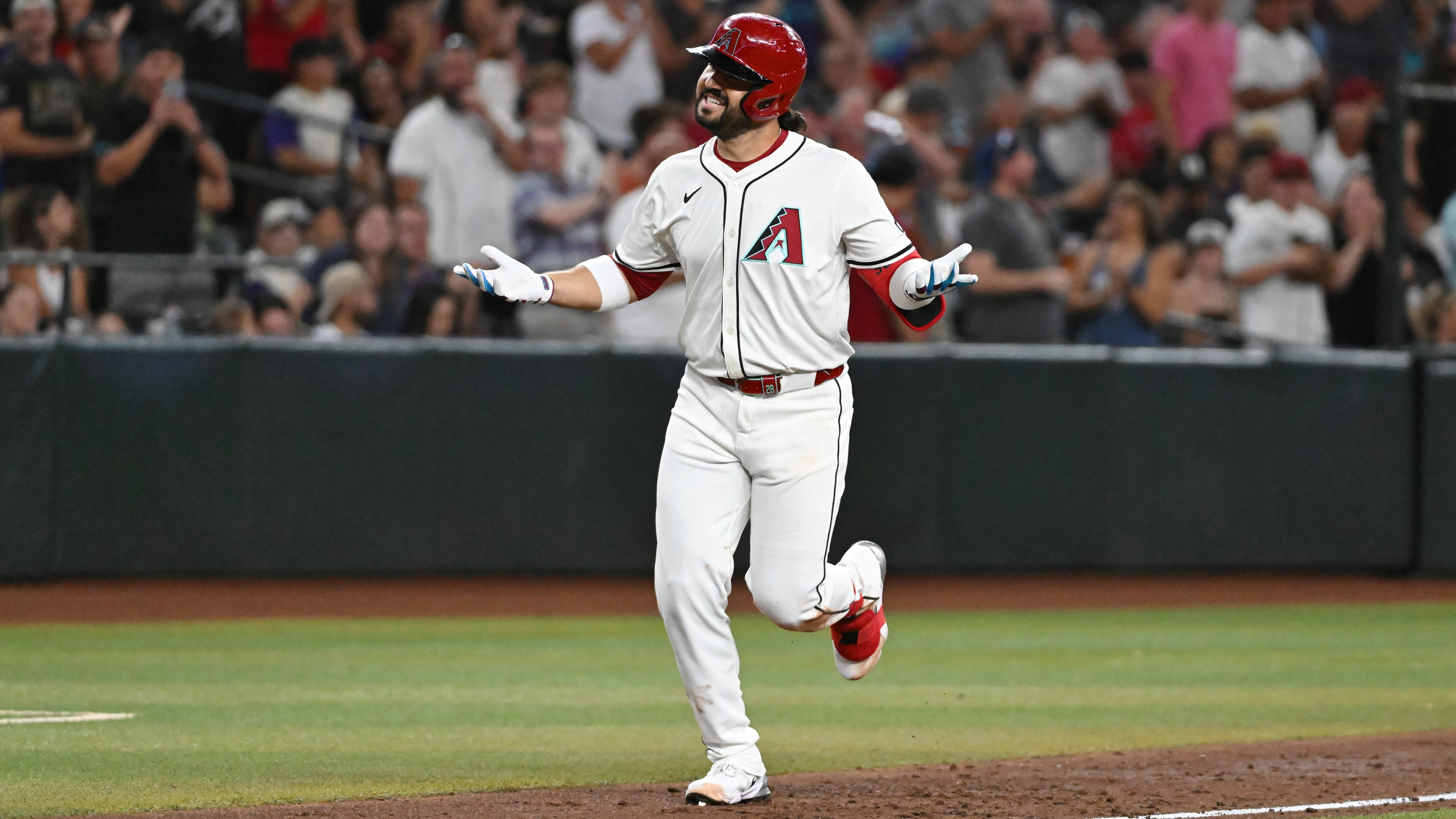 Eugenio Suárez celebrates his homer with a shrug