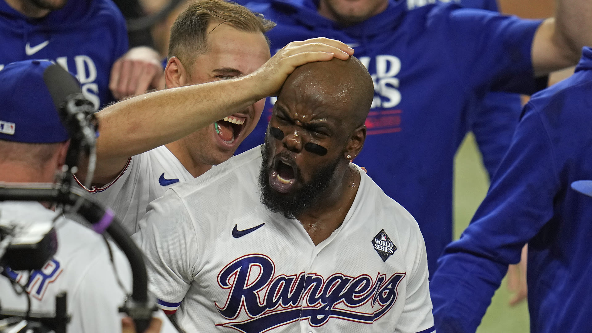 Adolis García celebrates after a walk-off home run