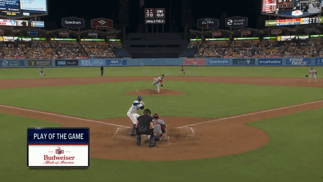 An animated gif of Ryne Stanek kicking a ground ball in the air to himself