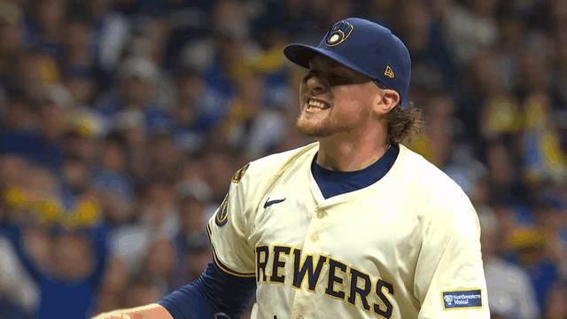 An animated gif of Brewers pitcher Chad Patrick shouting in excitement after a strikeout