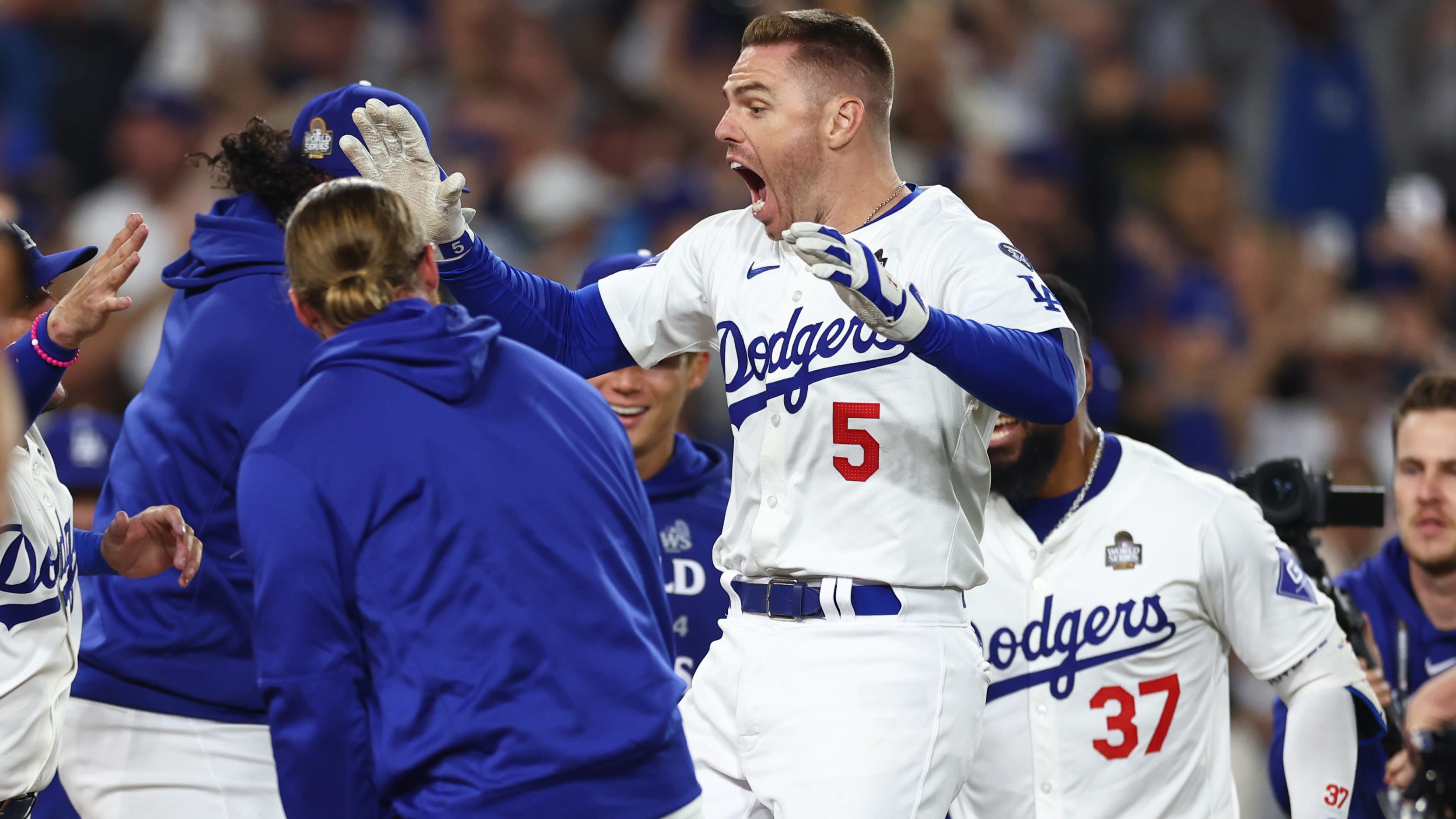 Freddie Freeman and the Dodgers celebrate after winning Game 1 of the World Series