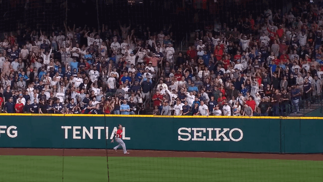An animated gif of Trayce Thompson robbing a home run