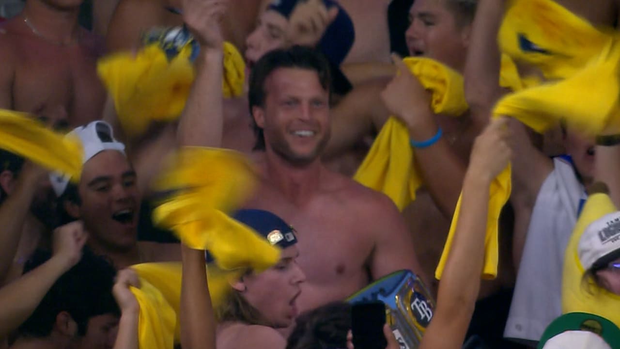 Brett Phillips goes shirtless in the Tropicana Field stands